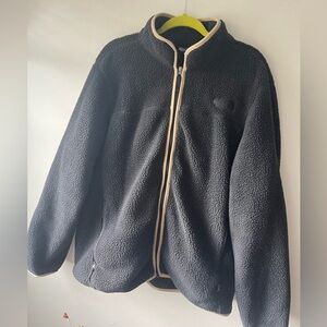 Men’s black and tan north face fleece